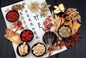 A table topped with bowls of different types of food.